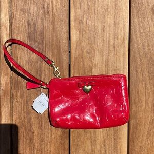 NWT Coach wristlet in Red